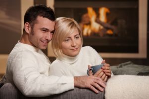 Decorative: Couple Comfortable At Home In The Winter