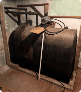 Draining And Removing An Old Oil Tank Is Part Of The Job